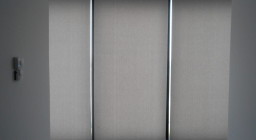 Моторизованные рулонные шторы для окон в пол